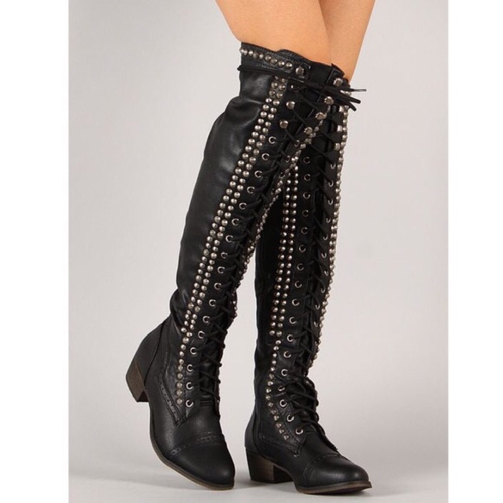 Black studded over-the-knee boots in size 7.5